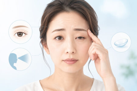 まぶたの重さや視野の狭さ、額のしわ、コンタクトレンズ使用など眼瞼下垂の症状を示す女性のイメージ